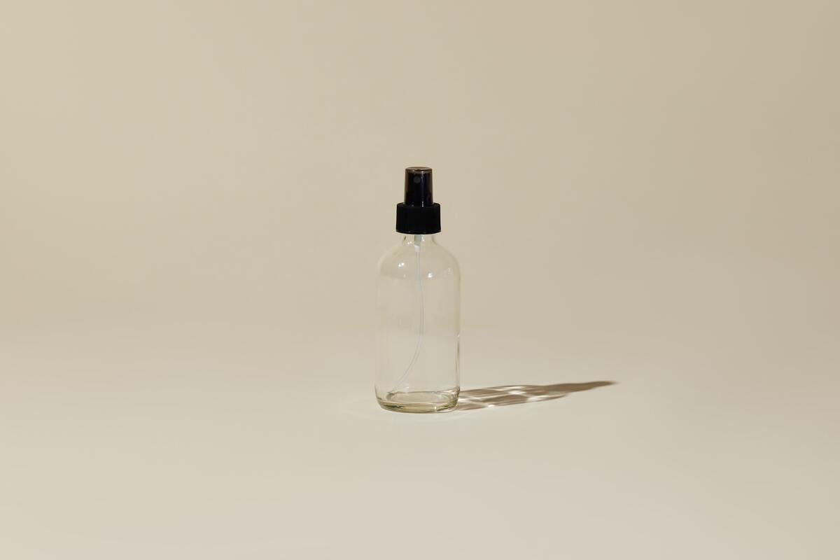 Clear Glass Bottle with Black Sprayer