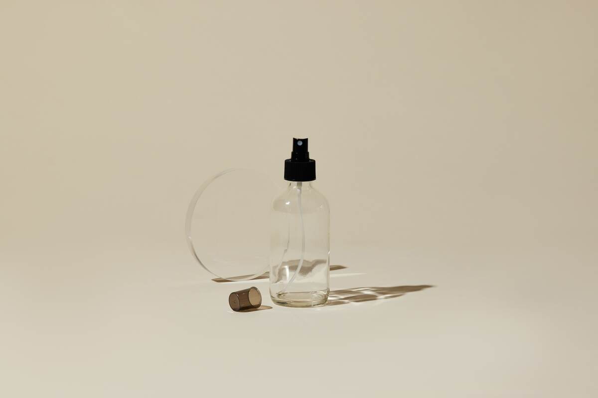 Clear Glass Bottle with Black Sprayer